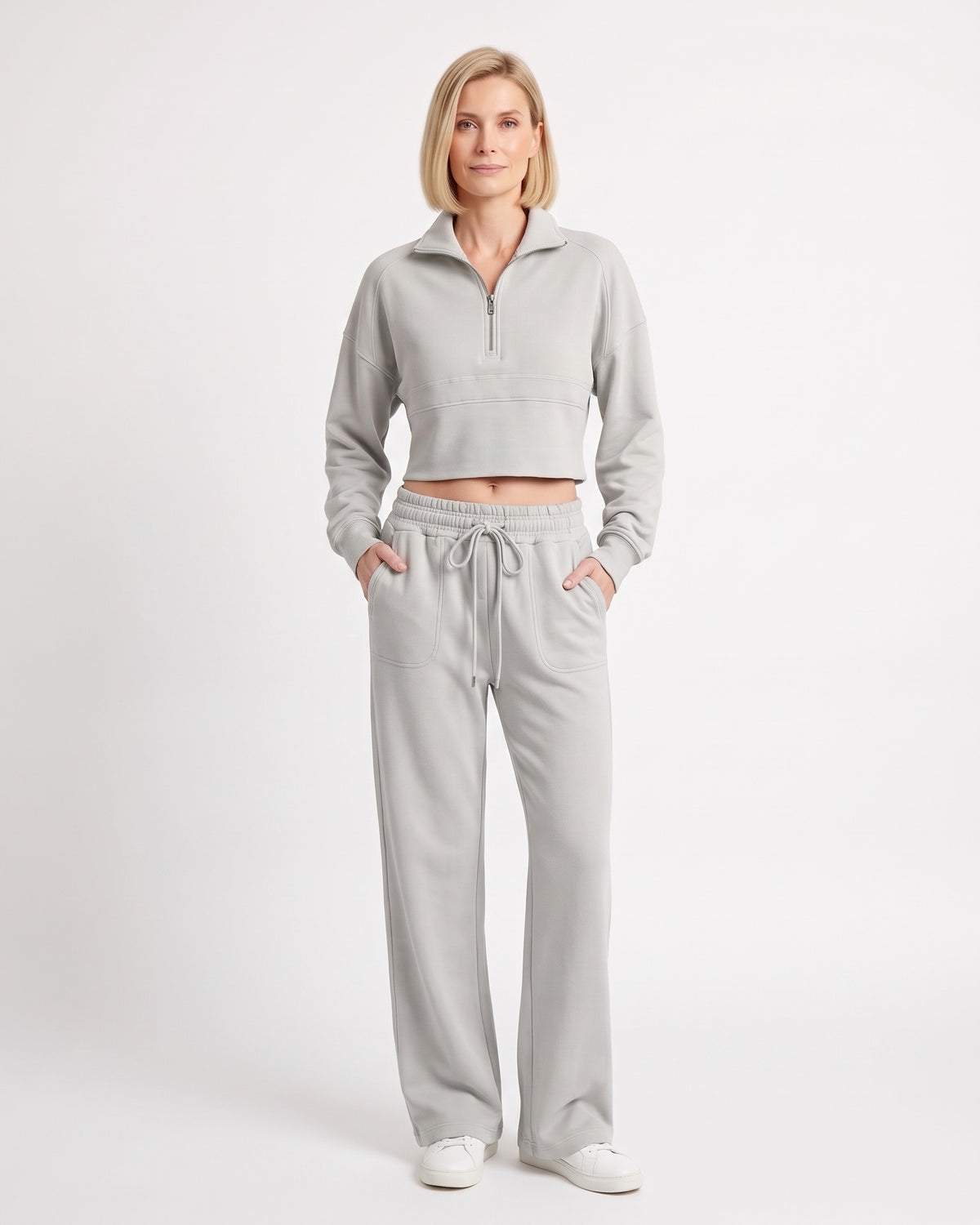 Light gray sweatsuit with collared cropped half-zip top and wide-leg drawstring pants