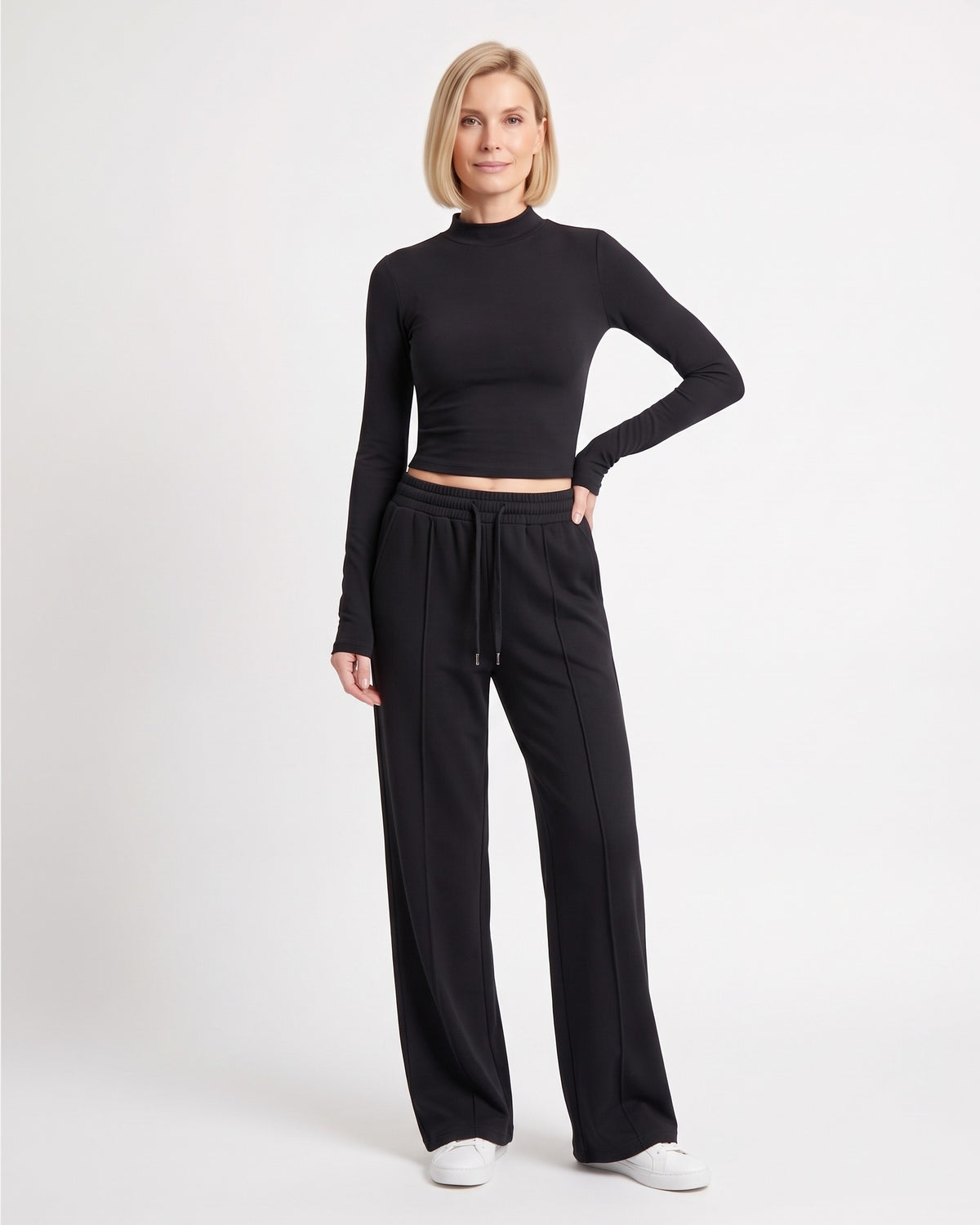 Women's black mock-neck crop top and wide-leg sweatpants set, drawstring waist