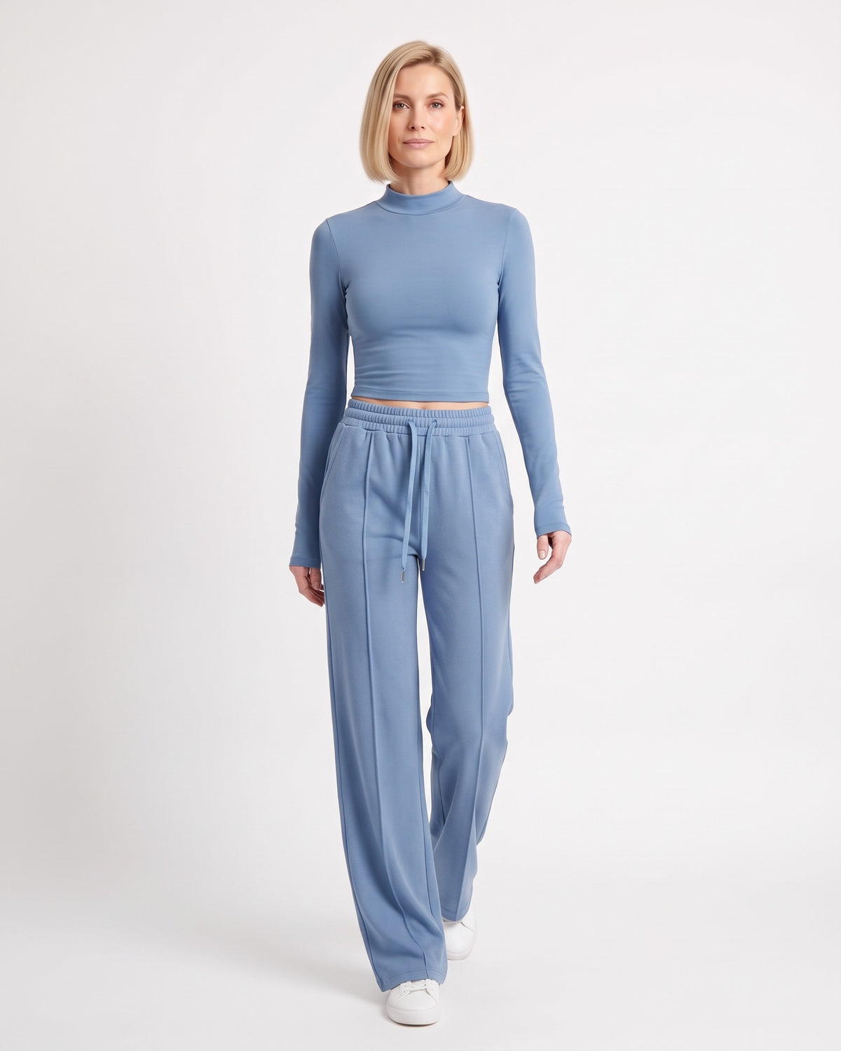 Women's light blue mock-neck crop top and wide-leg sweatpants set, drawstring waist