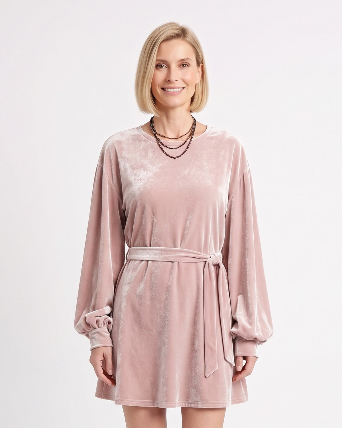 Velvet mini dress in light pink with round neck, long lantern sleeves, tie waist