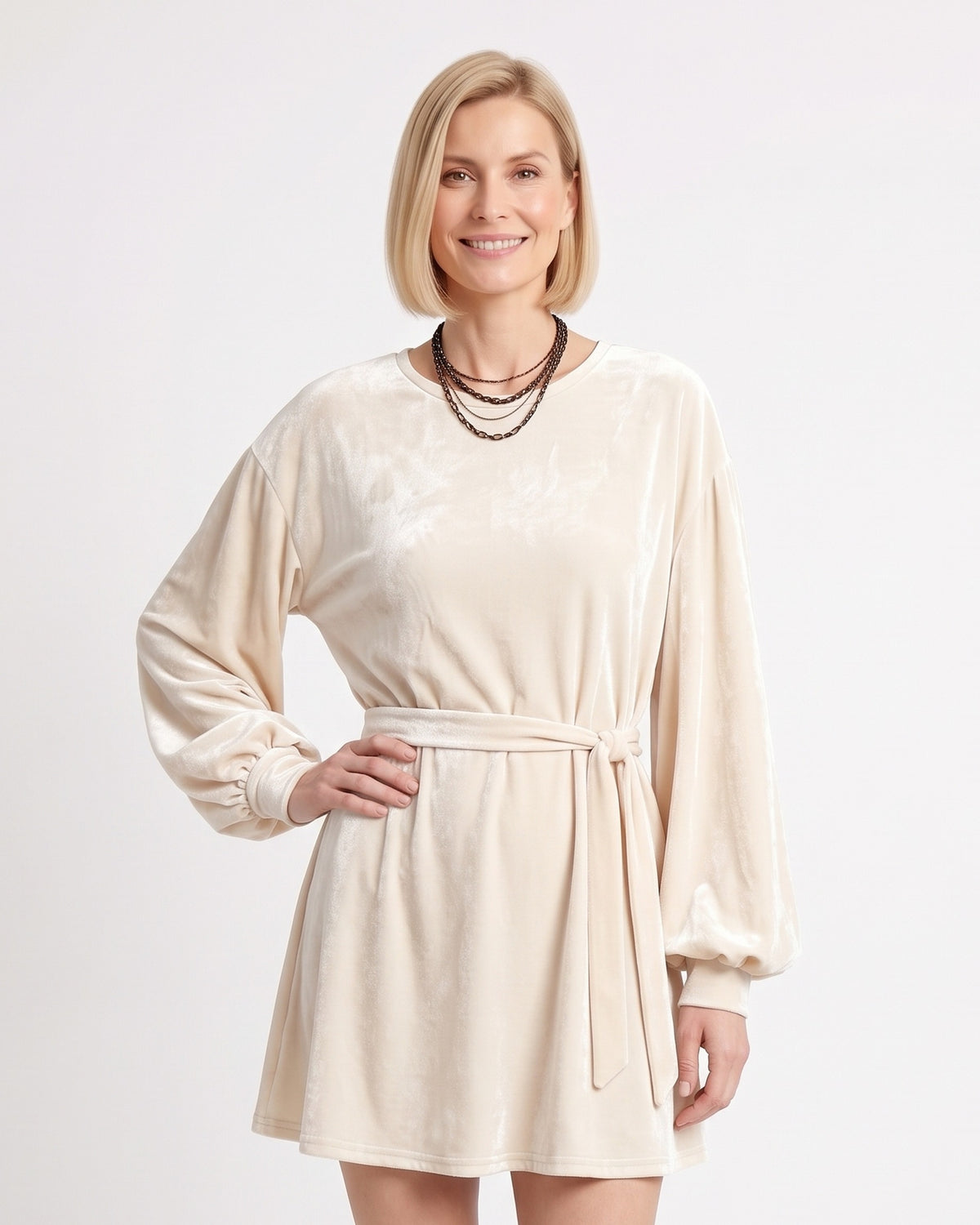 Off-white velvet mini dress with tie waist and long lantern sleeves, round neck