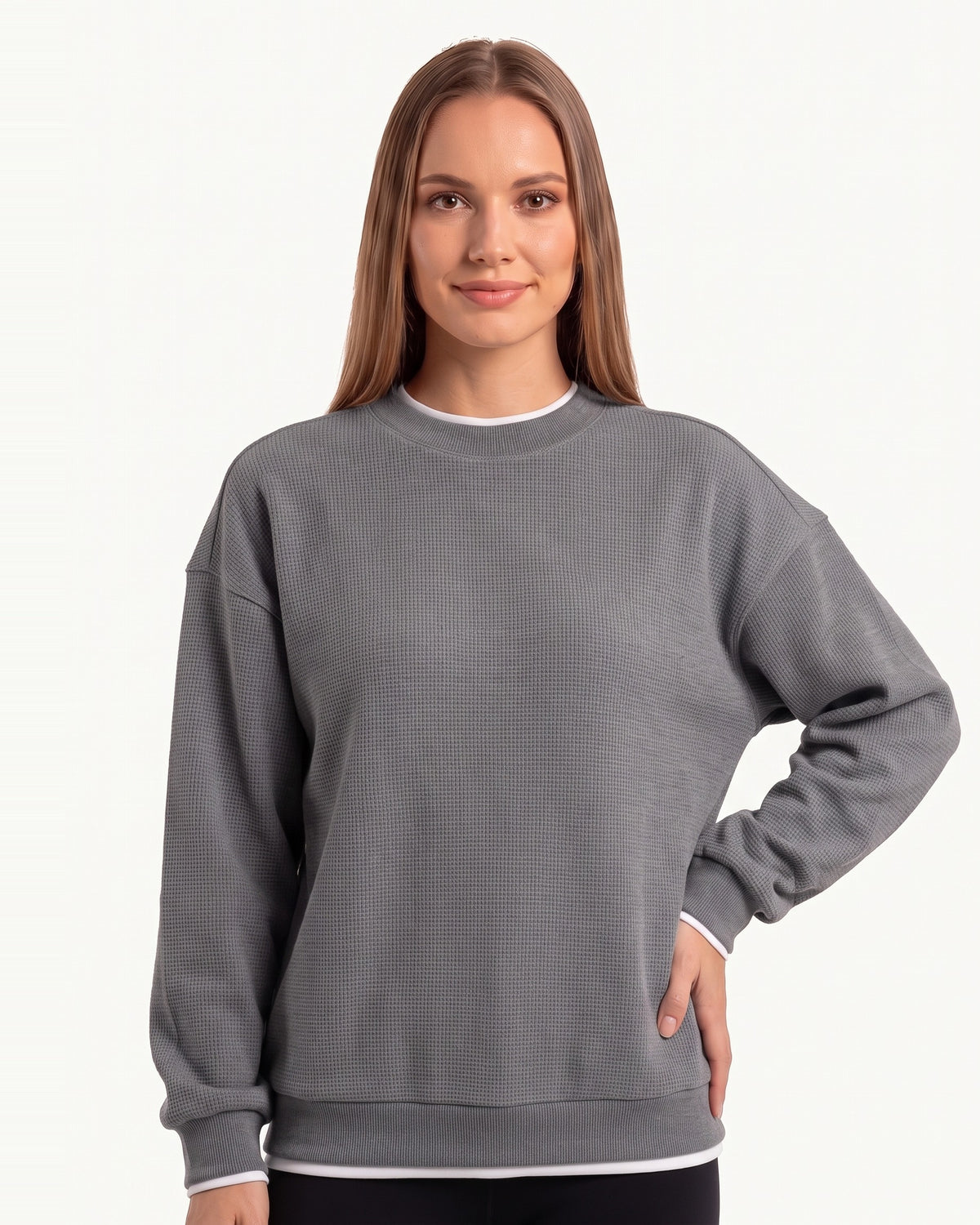 Gray waffle-knit crewneck sweatshirt with long sleeves and ribbed hem trim