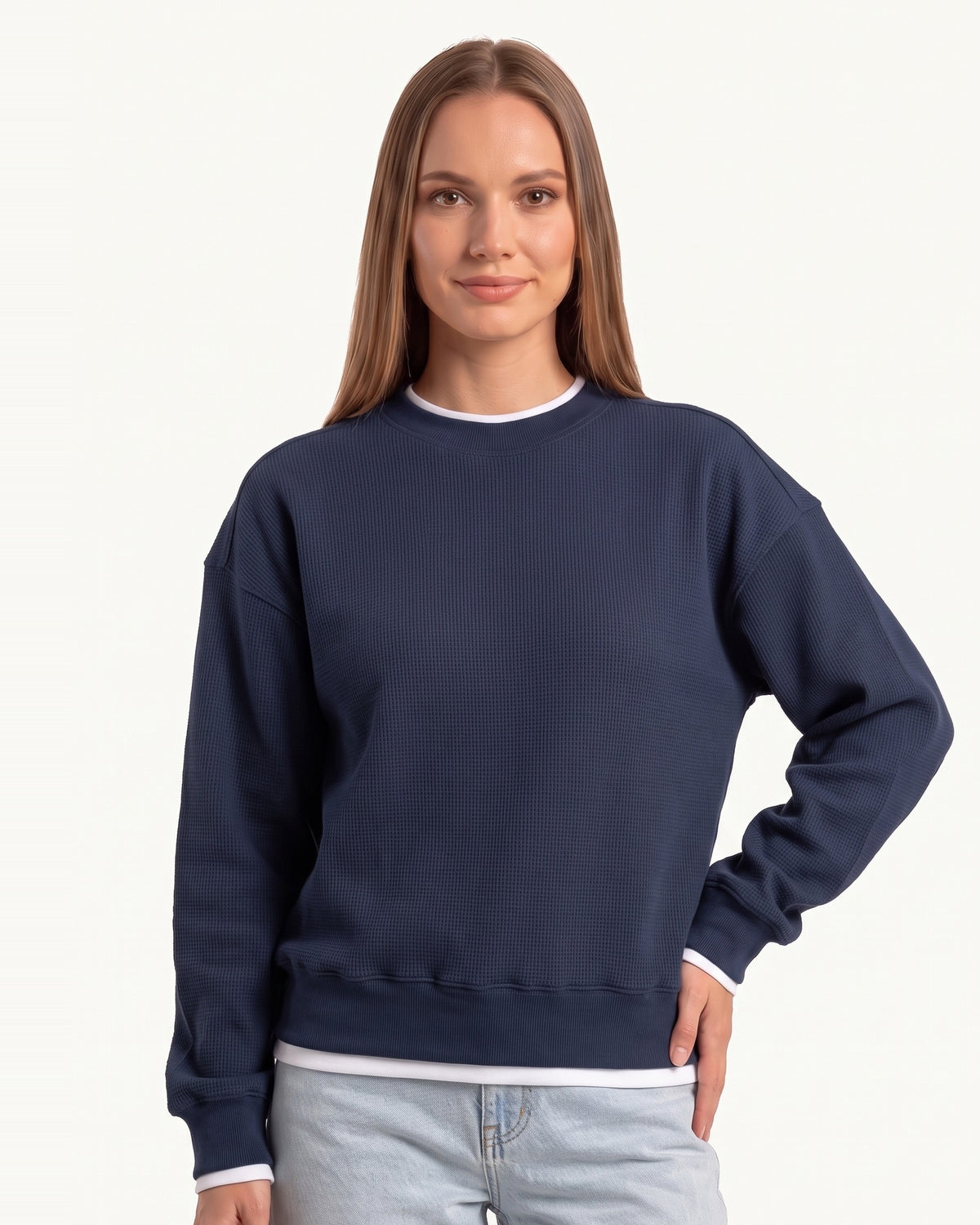 Navy waffle-knit crewneck sweatshirt with long sleeves and ribbed cuffs