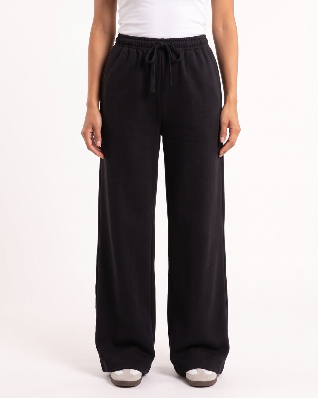 Black wide-leg drawstring sweatpants with elastic waistband and long relaxed leg openings