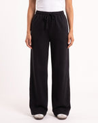 Black wide-leg drawstring sweatpants with elastic waistband and long relaxed leg openings