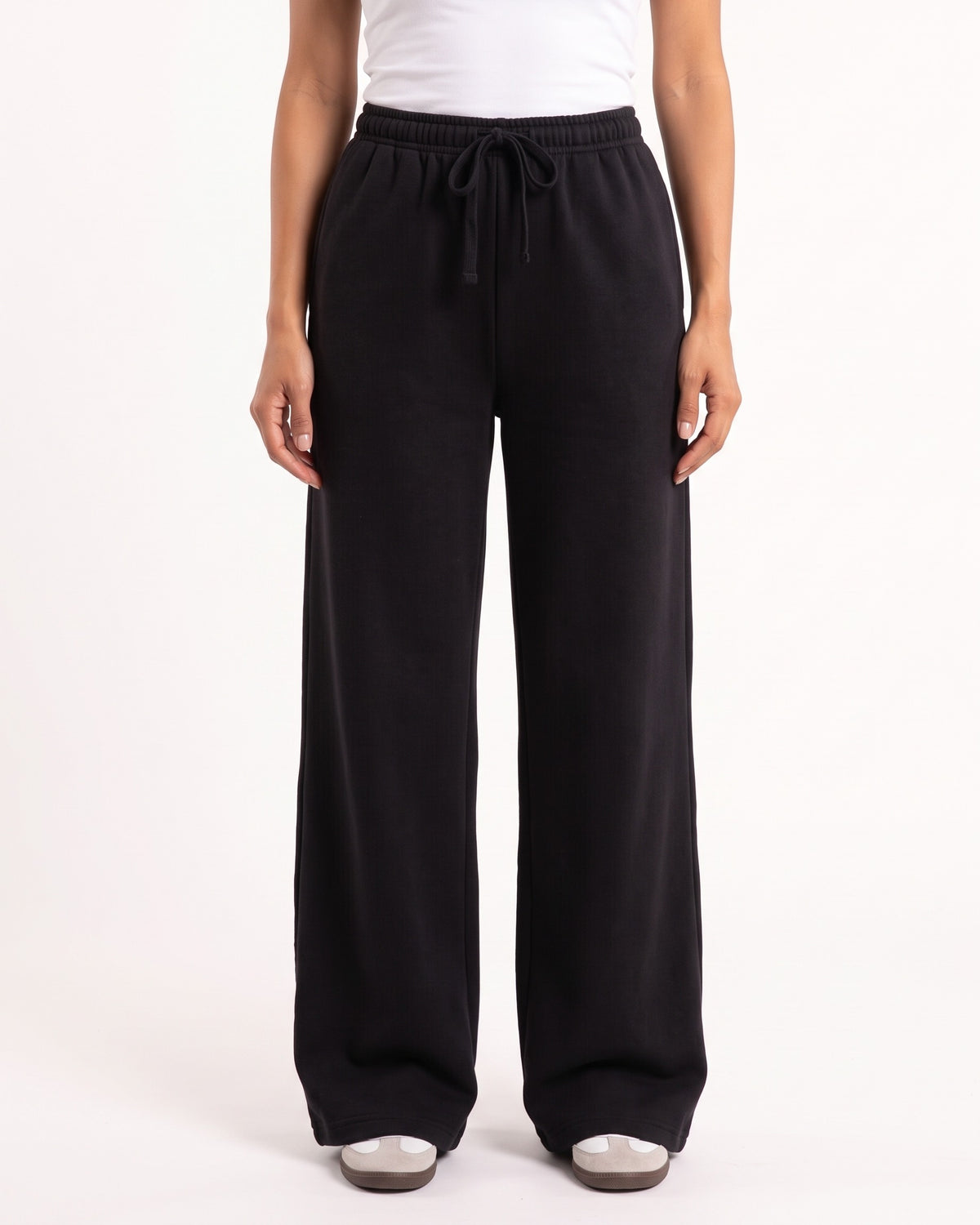 Black wide-leg drawstring sweatpants with elastic waistband and long relaxed leg openings