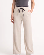 Beige wide-leg sweatpants with drawstring, elastic waist and side pockets