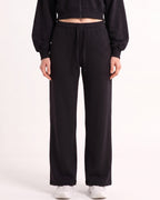 Black wide-leg sweatpants with drawstring waist and roomy straight legs