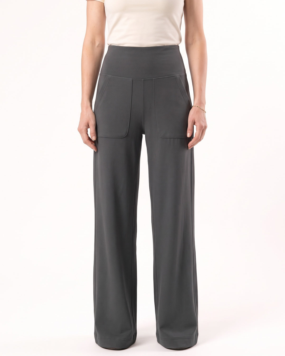 Dark gray wide-leg yoga pants with a high waistband and large front pockets.