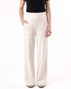Off-white wide-leg yoga pants with a high waistband and front pockets.