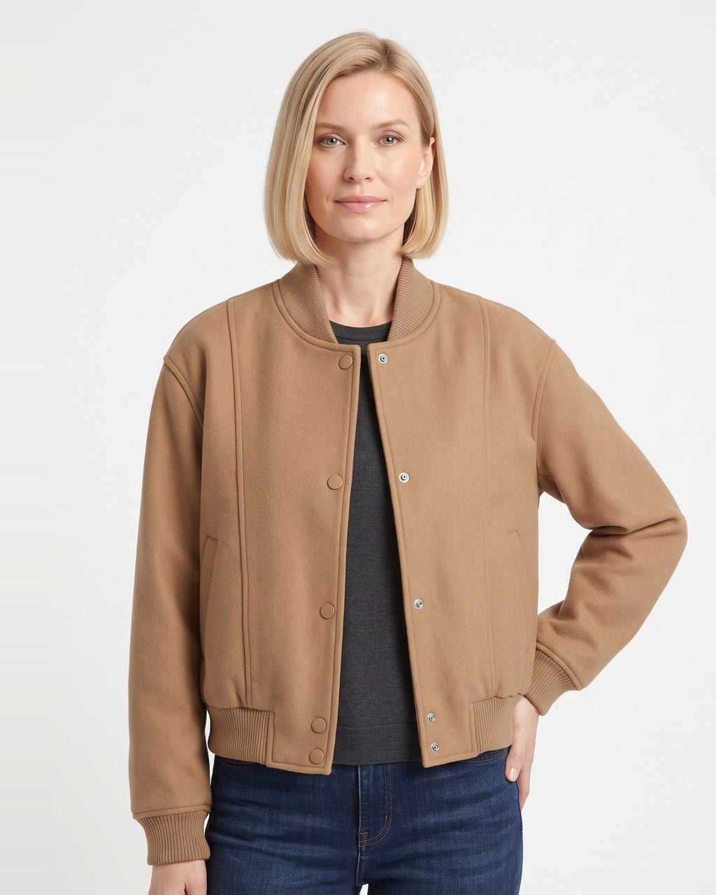 Women’s brown snap-front bomber jacket with ribbed cuffs, collar, and flap pockets
