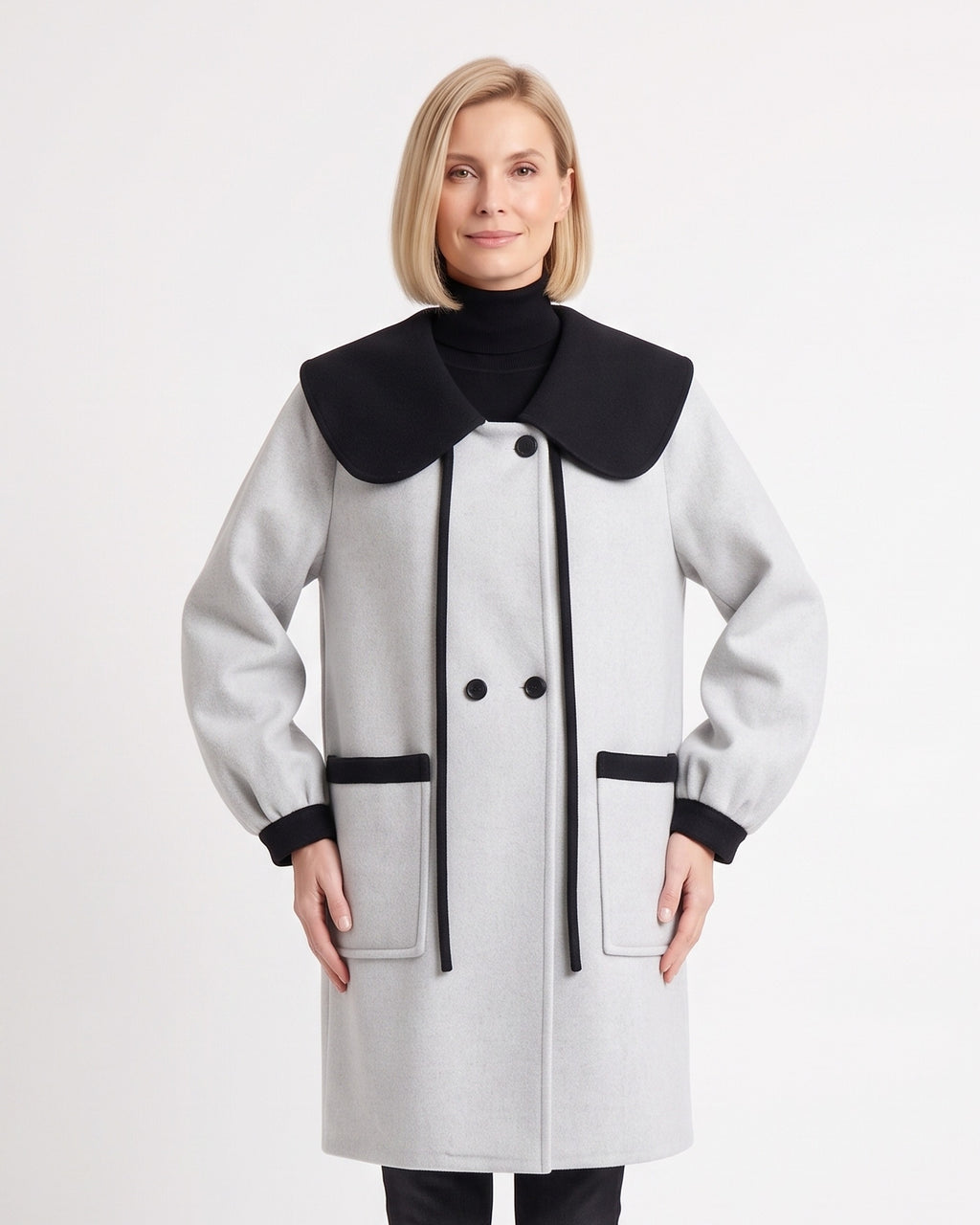 Women’s wool-blend coat in light gray with oversized black collar and double-breasted front buttons
