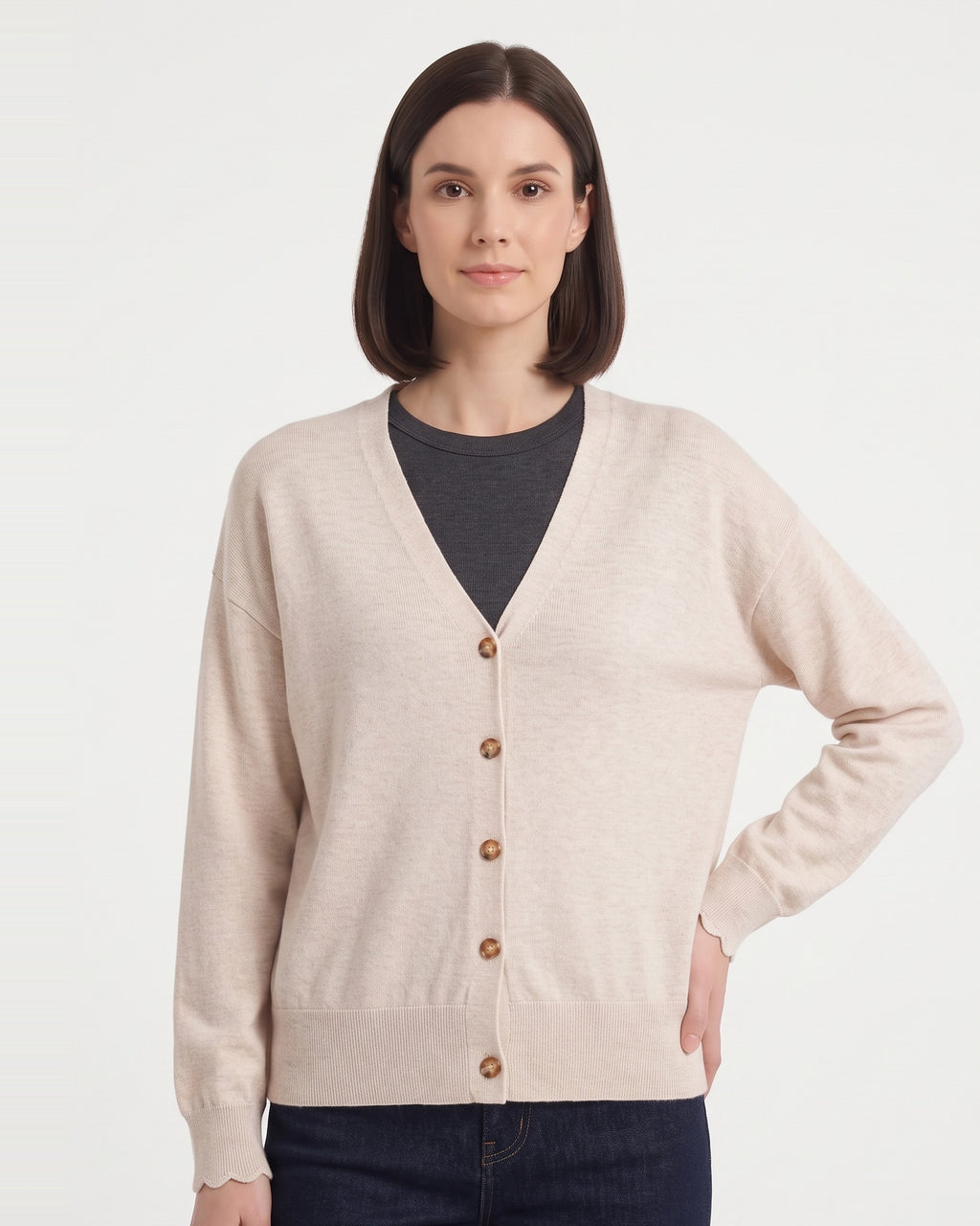 Cream wool V-neck button cardigan with ribbed cuffs and front buttons