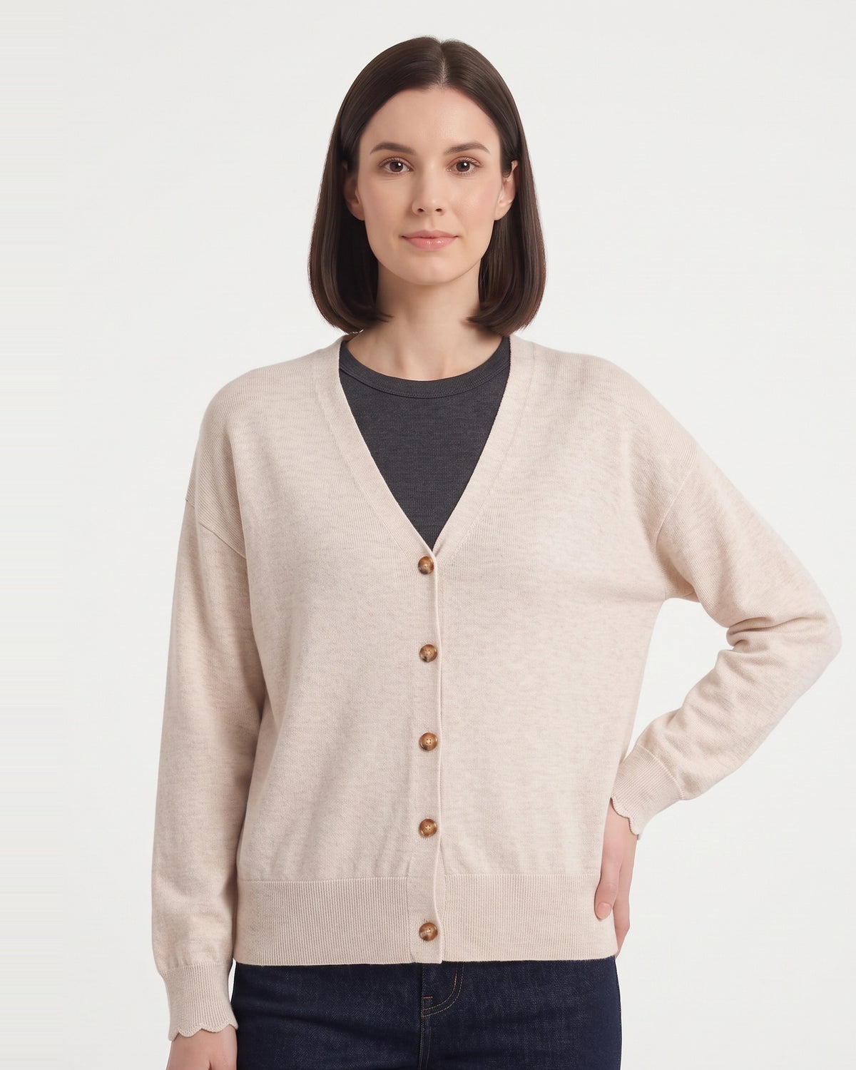 Cream wool V-neck button cardigan with ribbed cuffs and front buttons