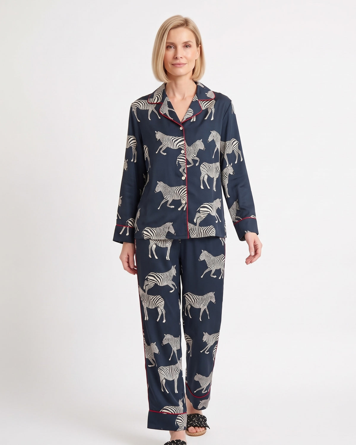 Women’s zebra print satin pajama set with navy long-sleeve notch-collar button top and pants