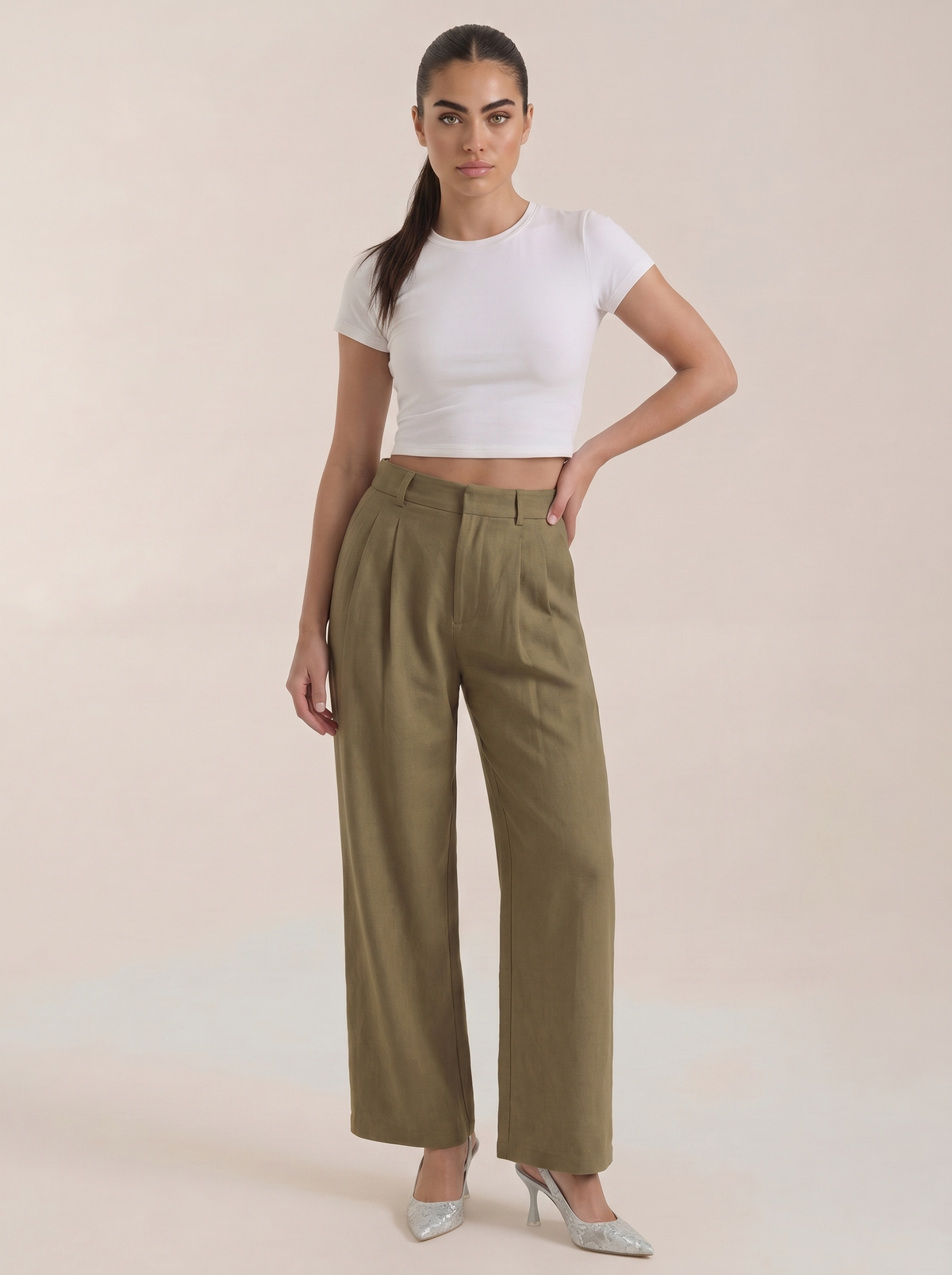 Dark green pleated high-rise wide-leg pants with front creases and side pockets