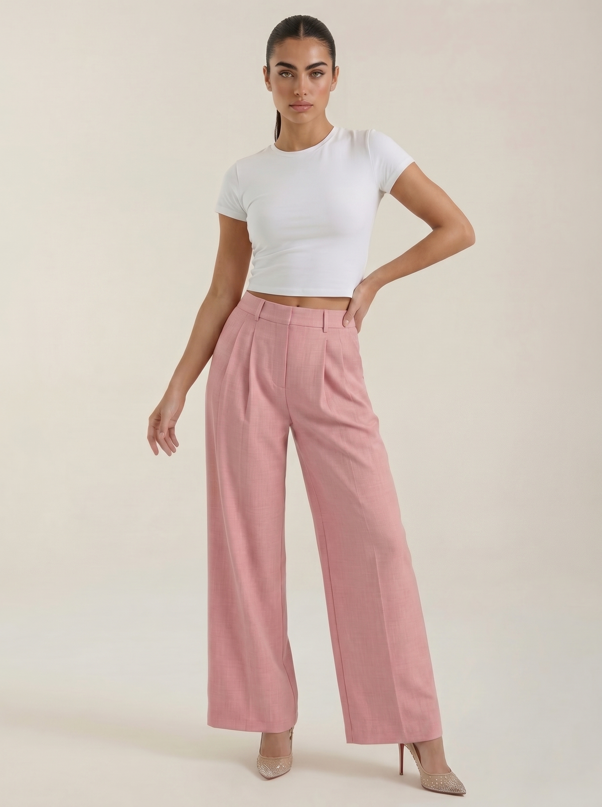 Pink pleated high-rise wide-leg pants with front creases and side pockets